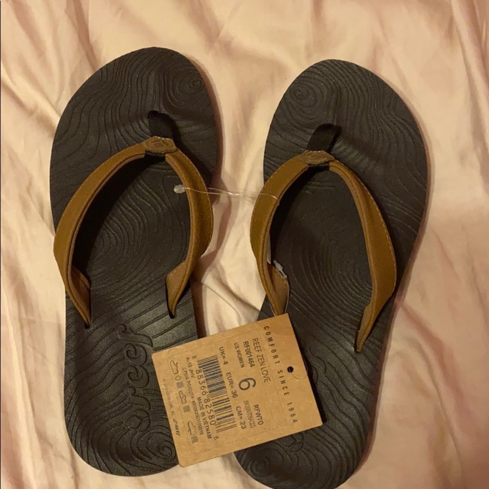Brown flip flops